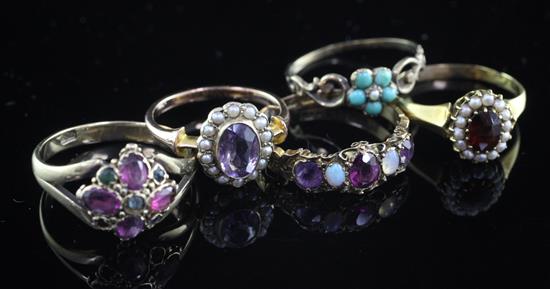 Five late 19th/early 20th century gold and gem set rings, various sizes.